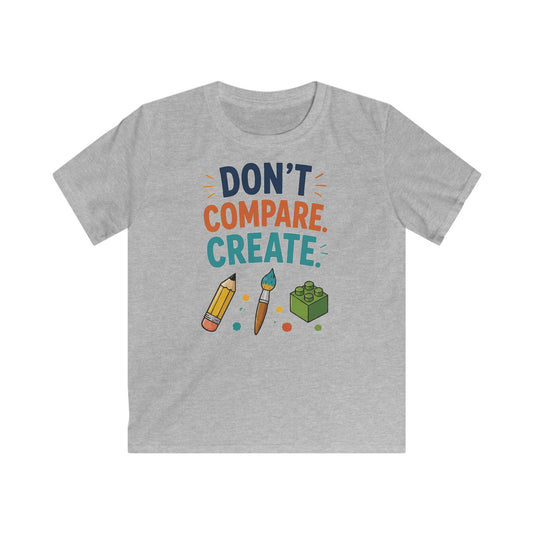 Kids Tee — “Don’t Compare. Create.” Artistic Pencil & Paintbrush Design